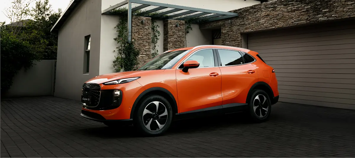 Orange LEPAS L6 outside a contemporary home